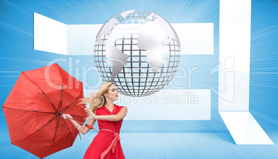 Composite image of elegant blonde holding umbrella