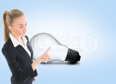 Composite image of businesswoman pointing somewhere