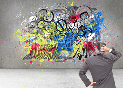 Composite image of young businessman standing back to camera scr