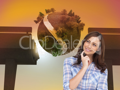 Composite image of thoughtful woman placing her finger on her ch