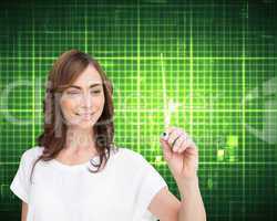 Composite image of smiling businesswoman holding marker