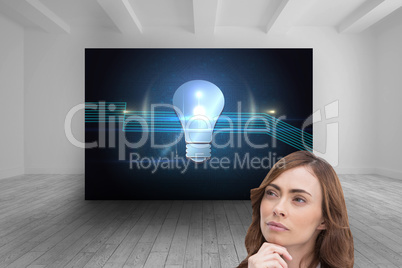 Composite image of thoughtful doctor looking away