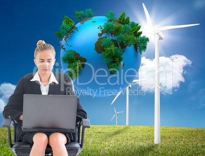 Composite image of businesswoman sitting on swivel chair with la