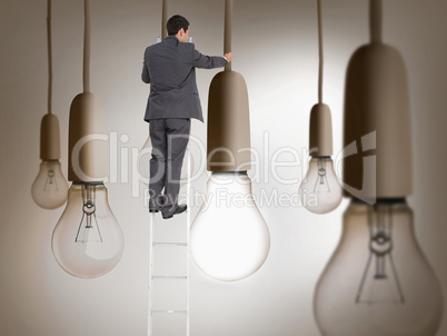 Composite image of businessman standing on ladder