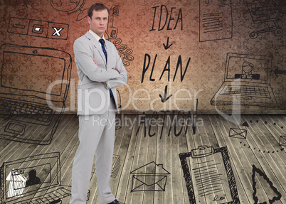 Composite image of serious businessman standing with his arms fo