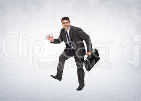 Composite image of cheerful businessman in a hury