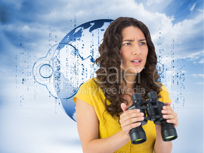 Composite image of serious casual young woman holding binoculars