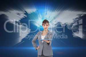 Composite image of attractive businesswoman holding tablet pc