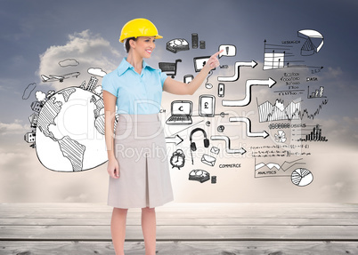 Composite image of smiling attractive architect pointing