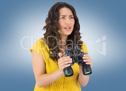 Composite image of serious casual young woman holding binoculars
