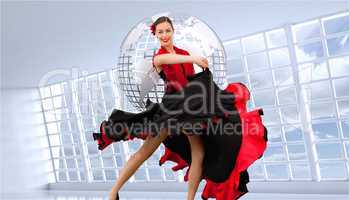 Composite image of dancing woman in a red and black dress