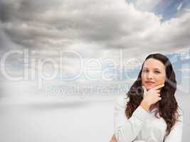 Composite image of portrait of a businesswoman posing