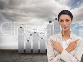 Composite image of charismatic businesswoman with her arms cross