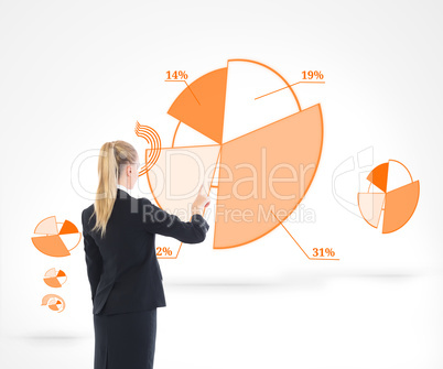 Composite image of businesswoman pointing somewhere