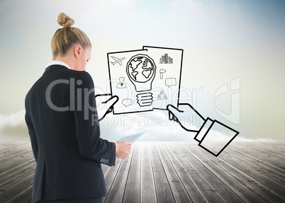 Composite image of businesswoman holding tablet