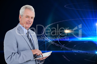 Composite image of side view of mature tradesman with tablet com