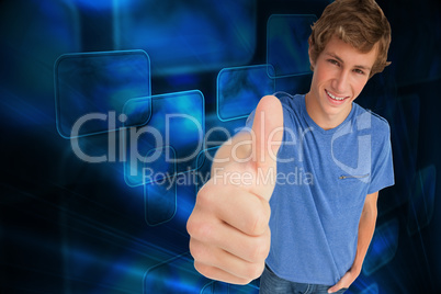 Composite image of fisheye view of a male student the thumb-up