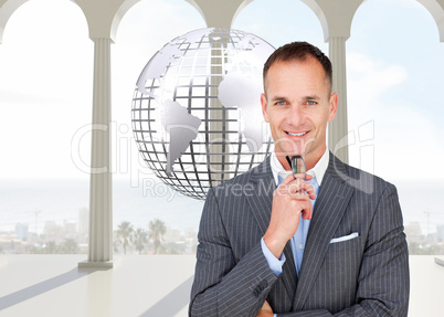 Composite image of smiling businessman holding glasses