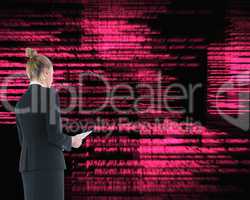 Composite image of businesswoman holding new tablet