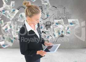 Composite image of businesswoman holding tablet