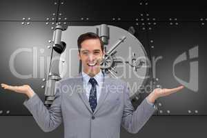 Composite image of smiling businessman presenting something with