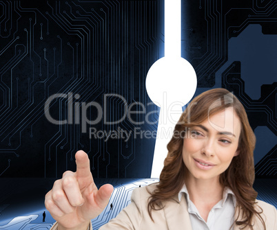 Composite image of businesswoman touching invisible screen