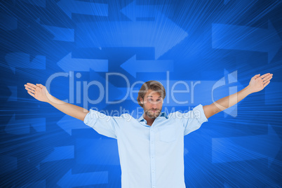 Composite image of handsome man raising hands
