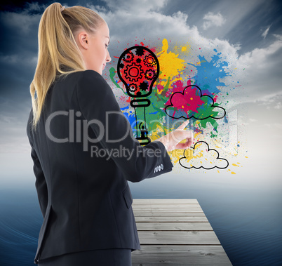 Composite image of businesswoman pointing somewhere