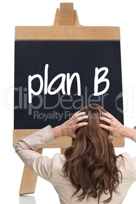 Composite image of young classy businesswoman with hands on head