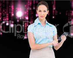 Composite image of serious classy businesswoman using calculator