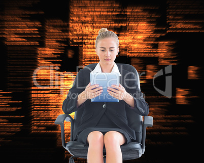 Composite image of front view of concentrated chic businesswoman