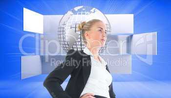 Composite image of businesswoman standing with hands on hips