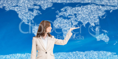 Composite image of businesswoman with empty hand open