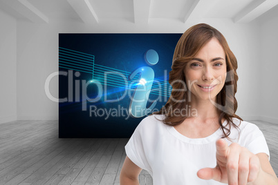 Composite image of attractive brunette pointing