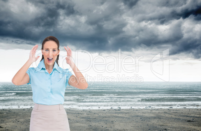 Composite image of surprised stylish businesswoman posing