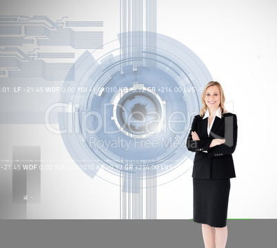 Composite image of a confident businesswoman with folded arms ag