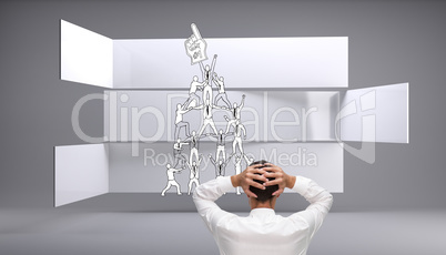 Composite image of businessman standing back to camera hands on