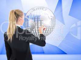 Composite image of businesswoman pointing somewhere