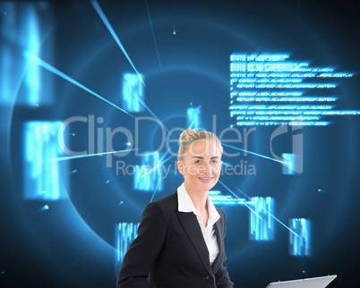 Composite image of businesswoman using laptop