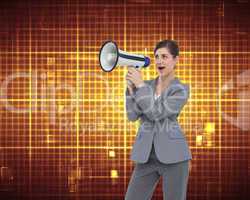 Composite image of businesswoman with loudspeaker