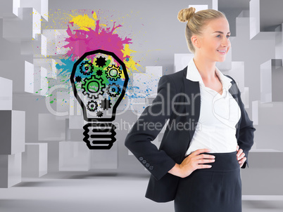 Composite image of businesswoman standing with hands on hips