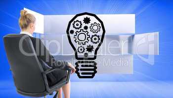 Composite image of businesswoman sitting on swivel chair in blac