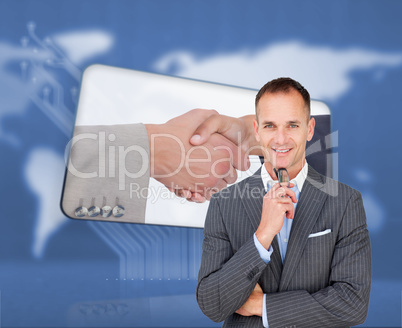 Composite image of smiling businessman holding glasses