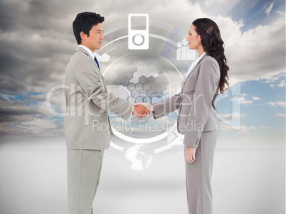 Composite image of side view of hand shaking trading partners