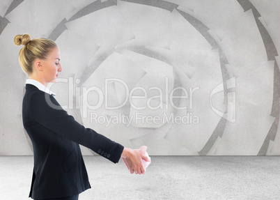 Composite image of businesswoman holding piggy bank