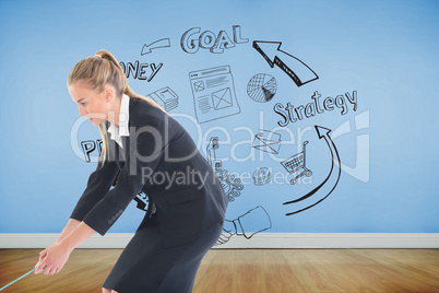 Composite image of businesswoman pulling a rope