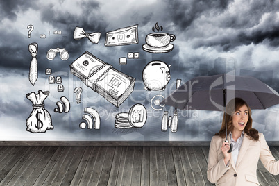 Composite image of elegant businesswoman holding black umbrella