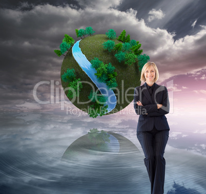 Composite image of friendly businesswoman smiling at the camera