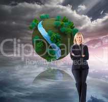 Composite image of friendly businesswoman smiling at the camera
