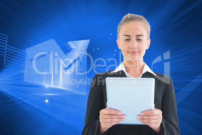 Composite image of businesswoman holding tablet Composite image of businesswoman holding tablet